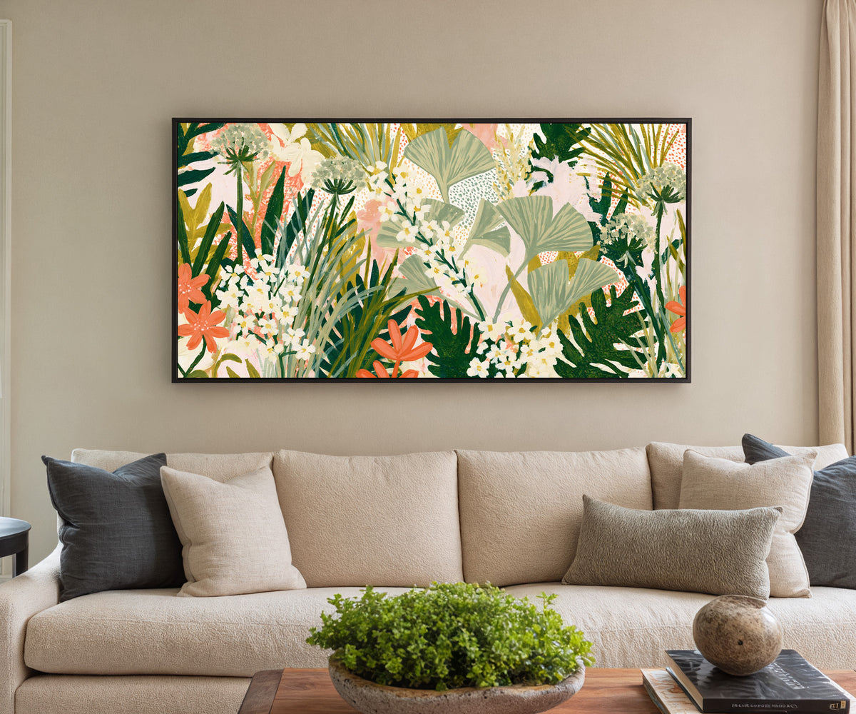 sage fan shaped leaves and white canvas wall art in a black floater frame in a styled room setting