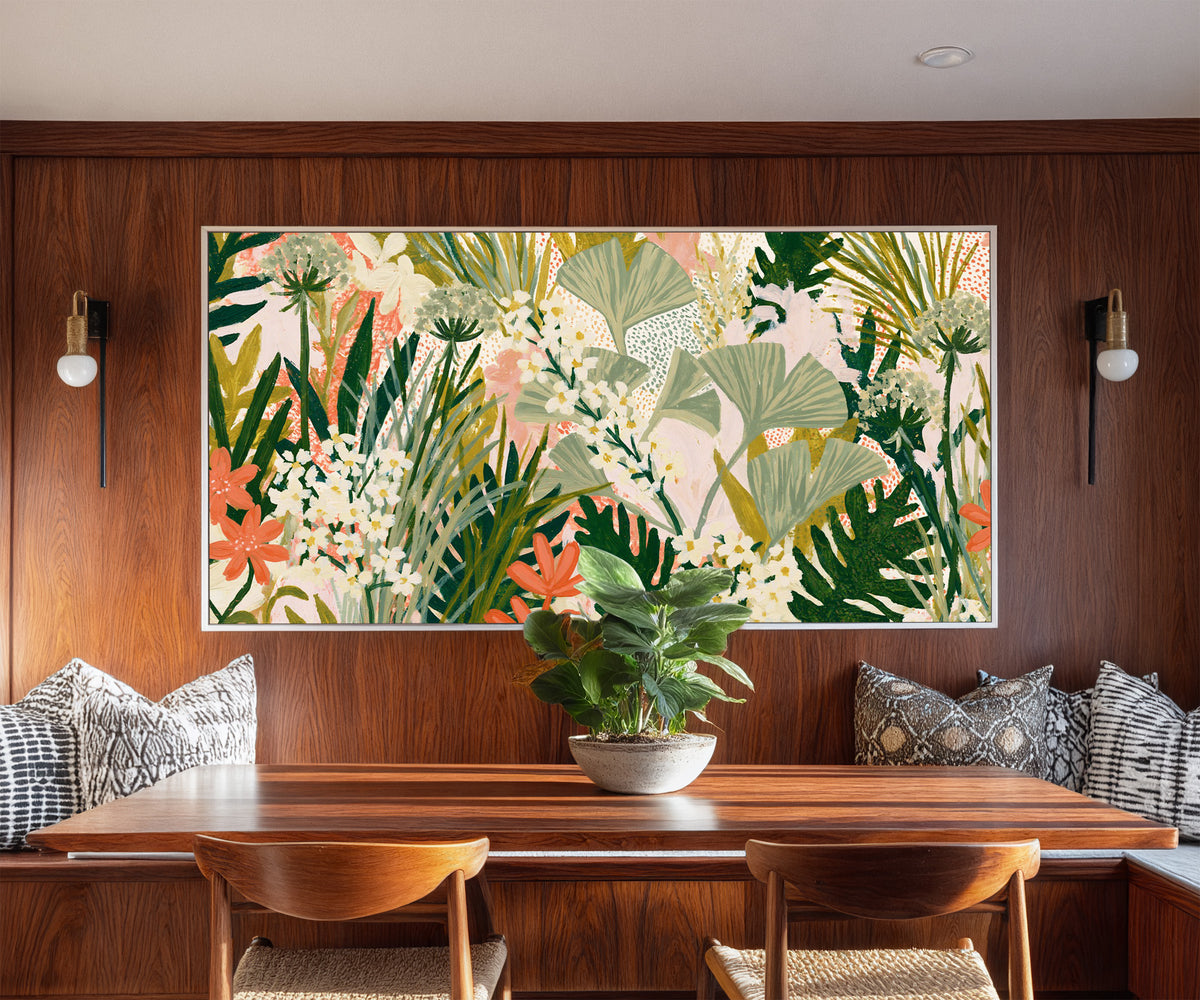 sage fan shaped leaves and white canvas wall art in a white floater frame in a styled room setting