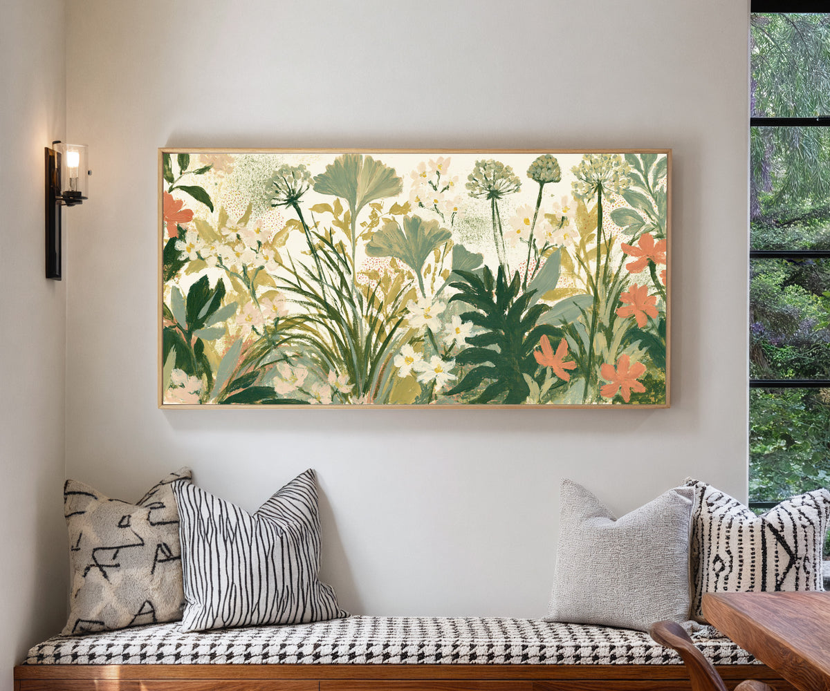 cream ground foliage with sage fans, white canvas wall art in a natural floater frame in a living room