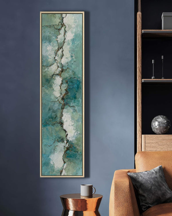 Vertical canvas wall art in interior setting.
