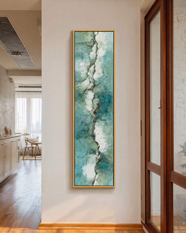 Vertical canvas wall art in interior setting.