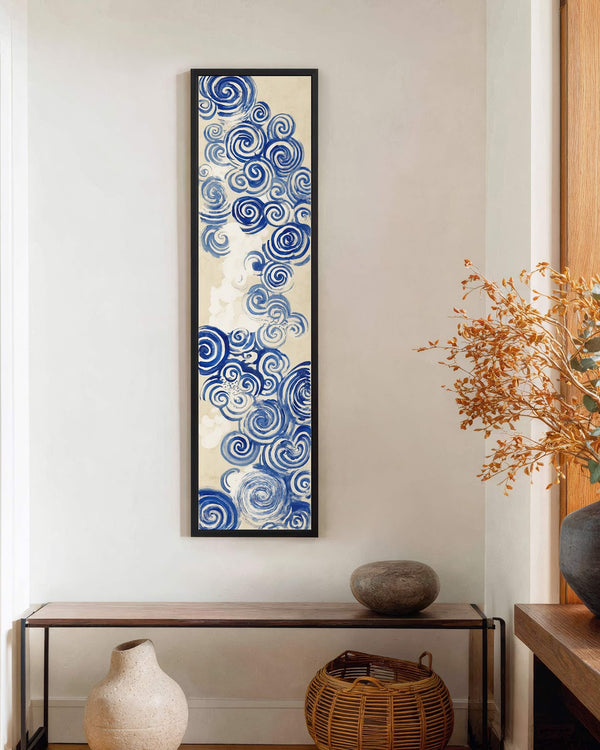 Vertical canvas wall art in interior setting.