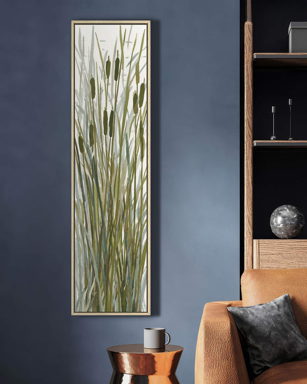 Vertical canvas wall art in interior setting.