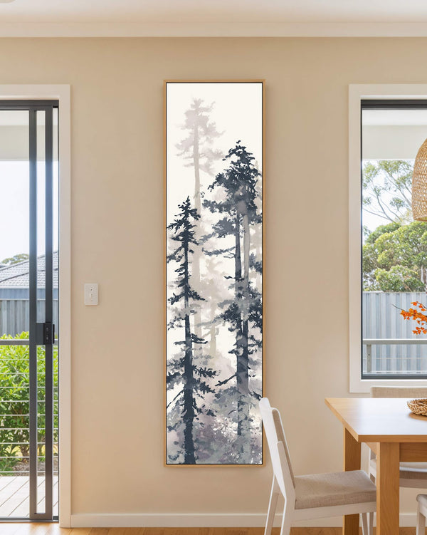 Vertical canvas wall art in interior setting.