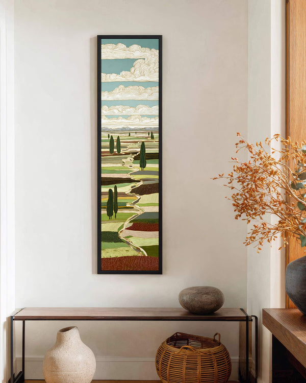 Vertical canvas wall art in interior setting.