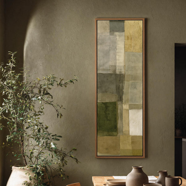 Vertical canvas wall art in interior setting.