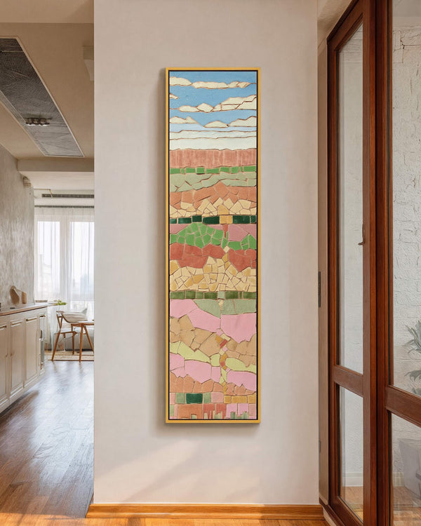 Vertical canvas wall art in interior setting.