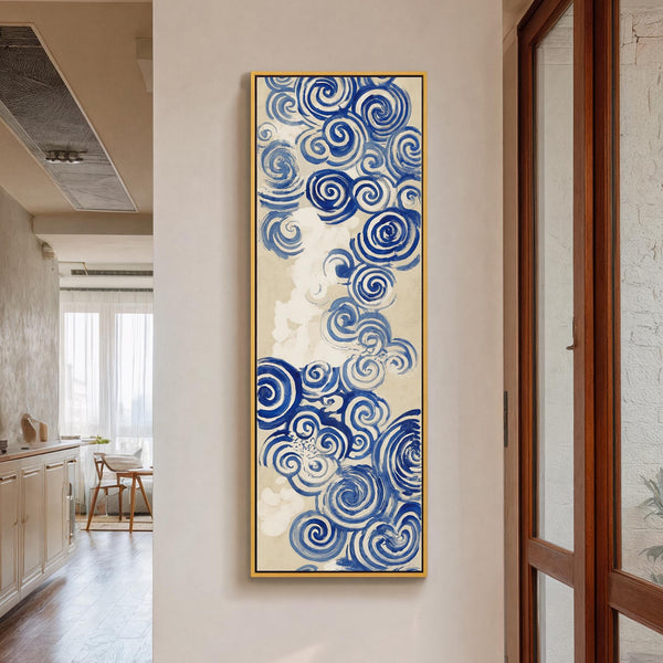 Vertical canvas wall art in interior setting.