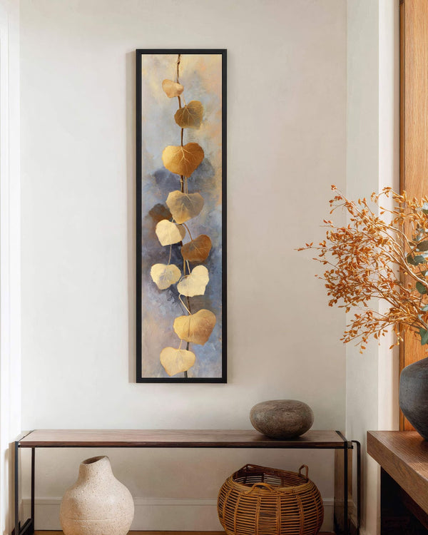 Vertical canvas wall art in interior setting.