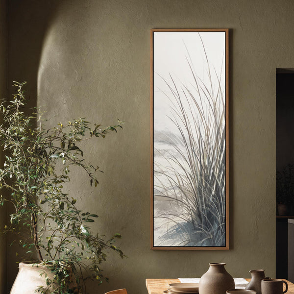 Vertical canvas wall art in interior setting.