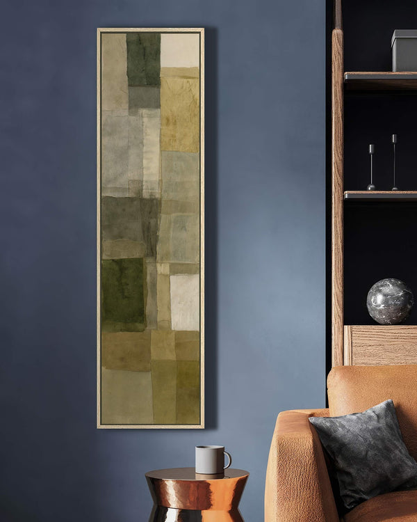 Vertical canvas wall art in interior setting.