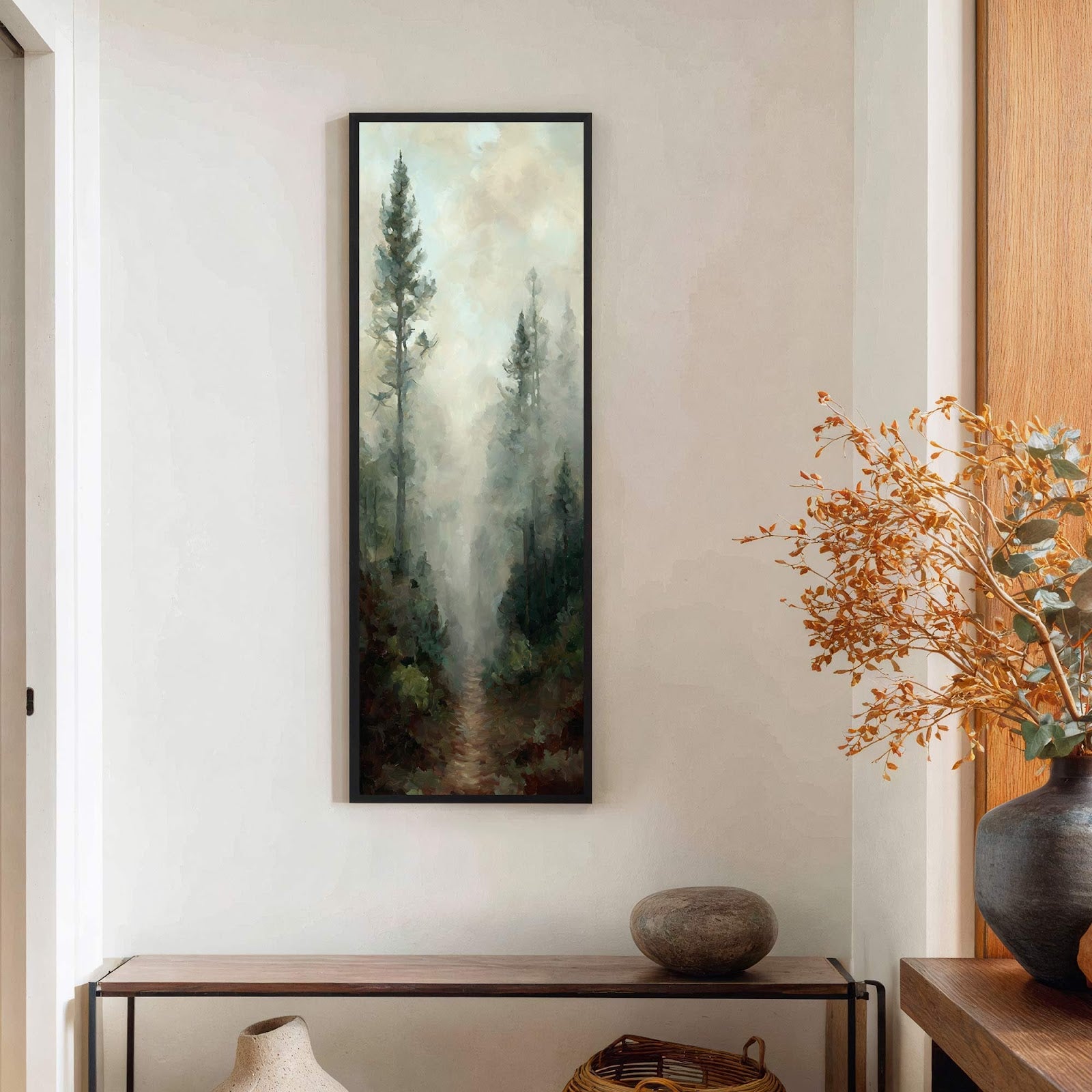This vertical canvas wall art depicts a foggy forest path with tall trees, rendered in a painterly style with muted greens and blues. It is displayed on a textured, off-white.