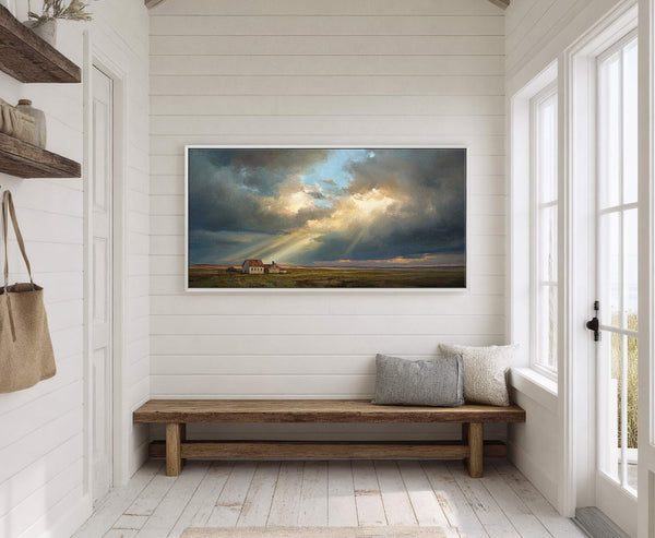 This horizontal canvas wall art features a rustic landscape with a farmhouse under a dramatic, sun-drenched sky, rendered in rich earth tones and blues. It is displayed in a room.