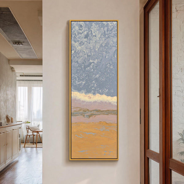 Vertical canvas wall art in interior setting.