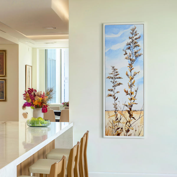 Vertical canvas wall art in interior setting.
