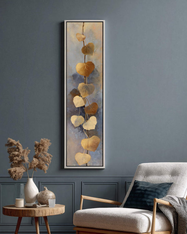 Vertical canvas wall art in interior setting.