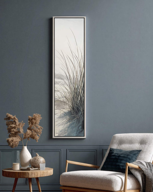 Vertical canvas wall art in interior setting.