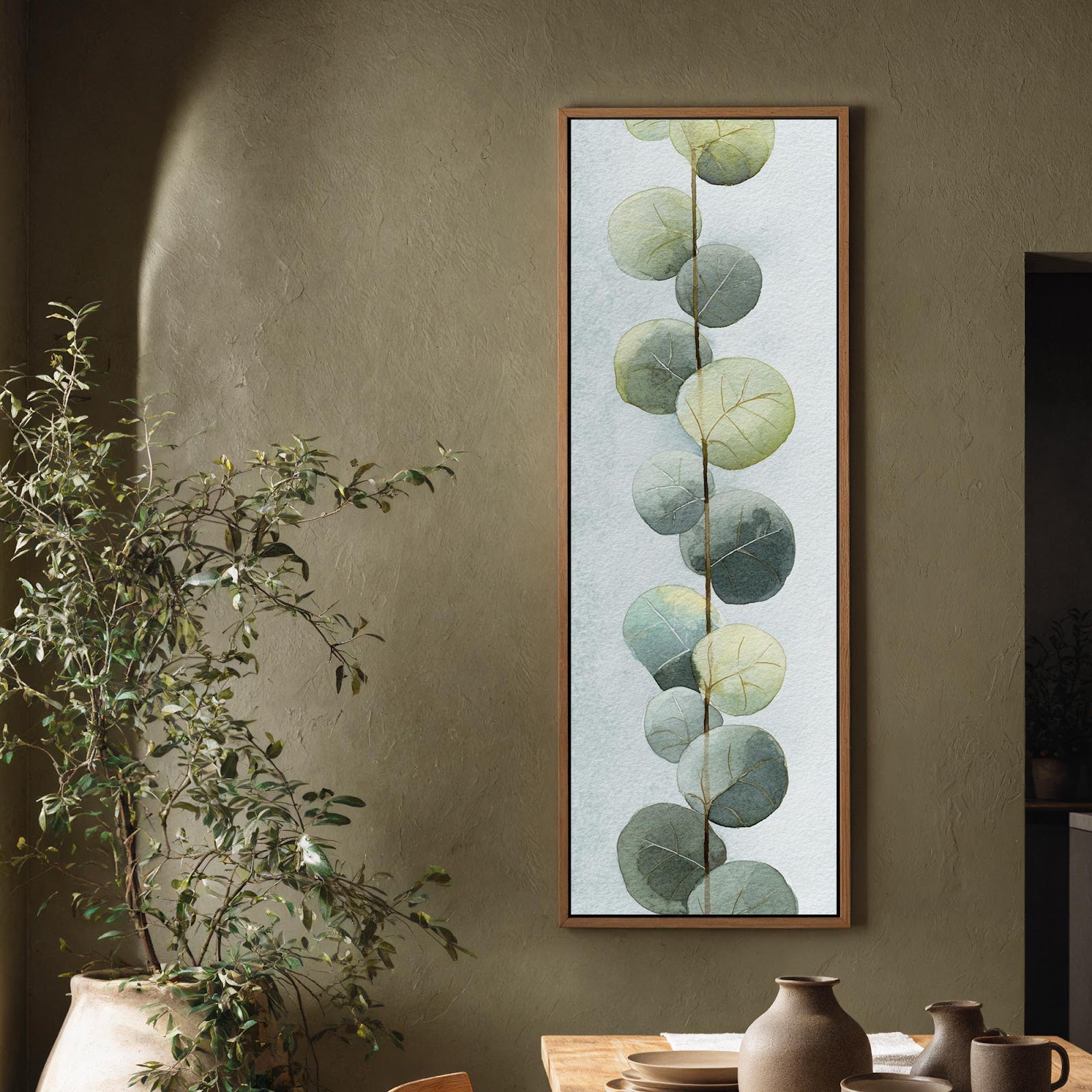 Vertical canvas wall art in interior setting.