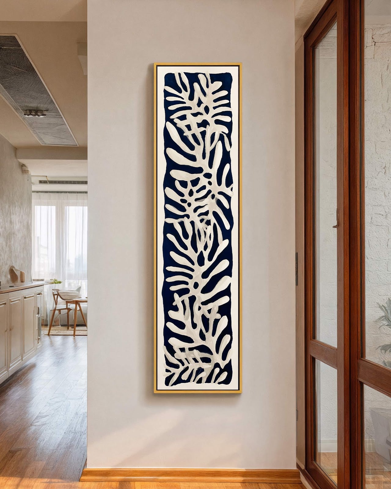 Vertical canvas wall art in interior setting.