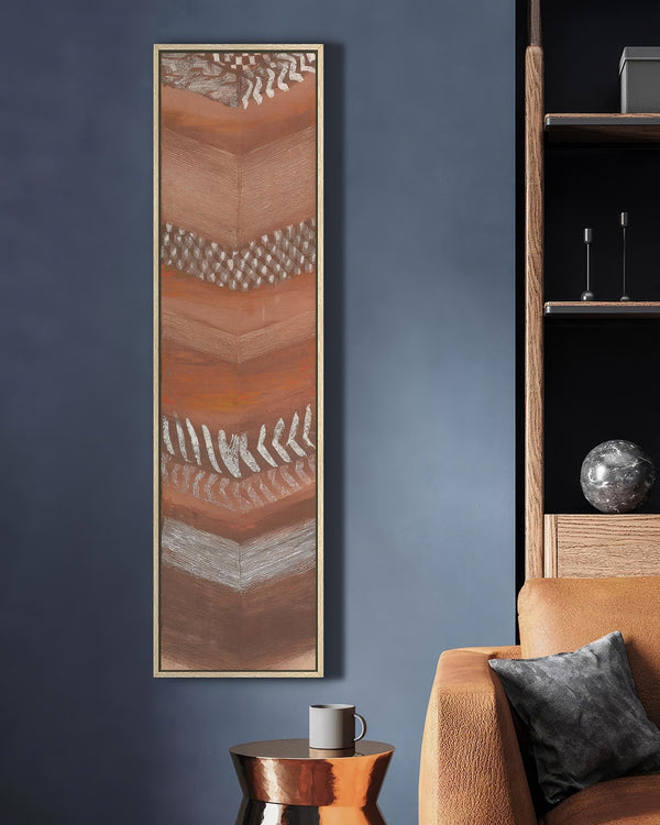 Vertical canvas wall art in interior setting.