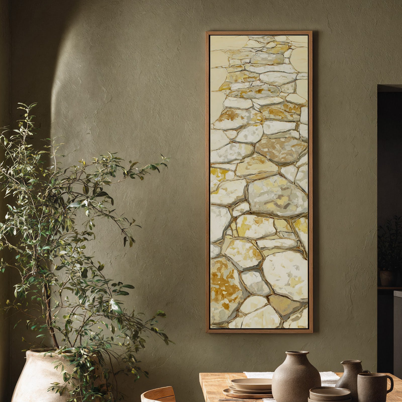Vertical canvas wall art in interior setting.