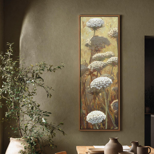 Vertical canvas wall art in interior setting.