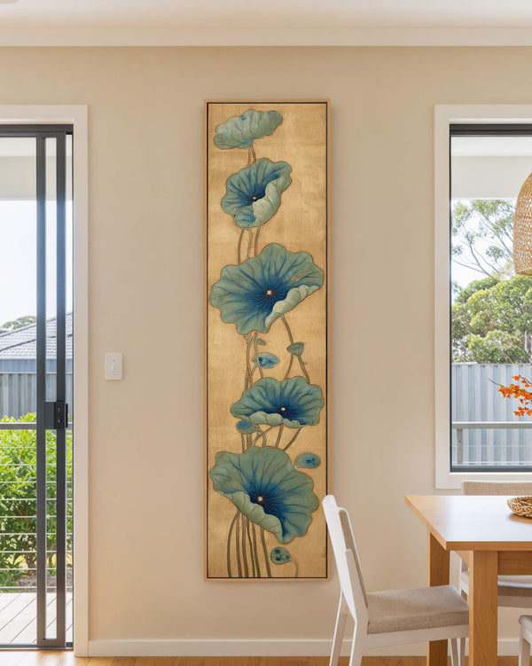 Vertical canvas wall art in interior setting.