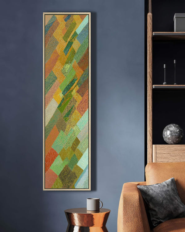 Vertical canvas wall art in interior setting.