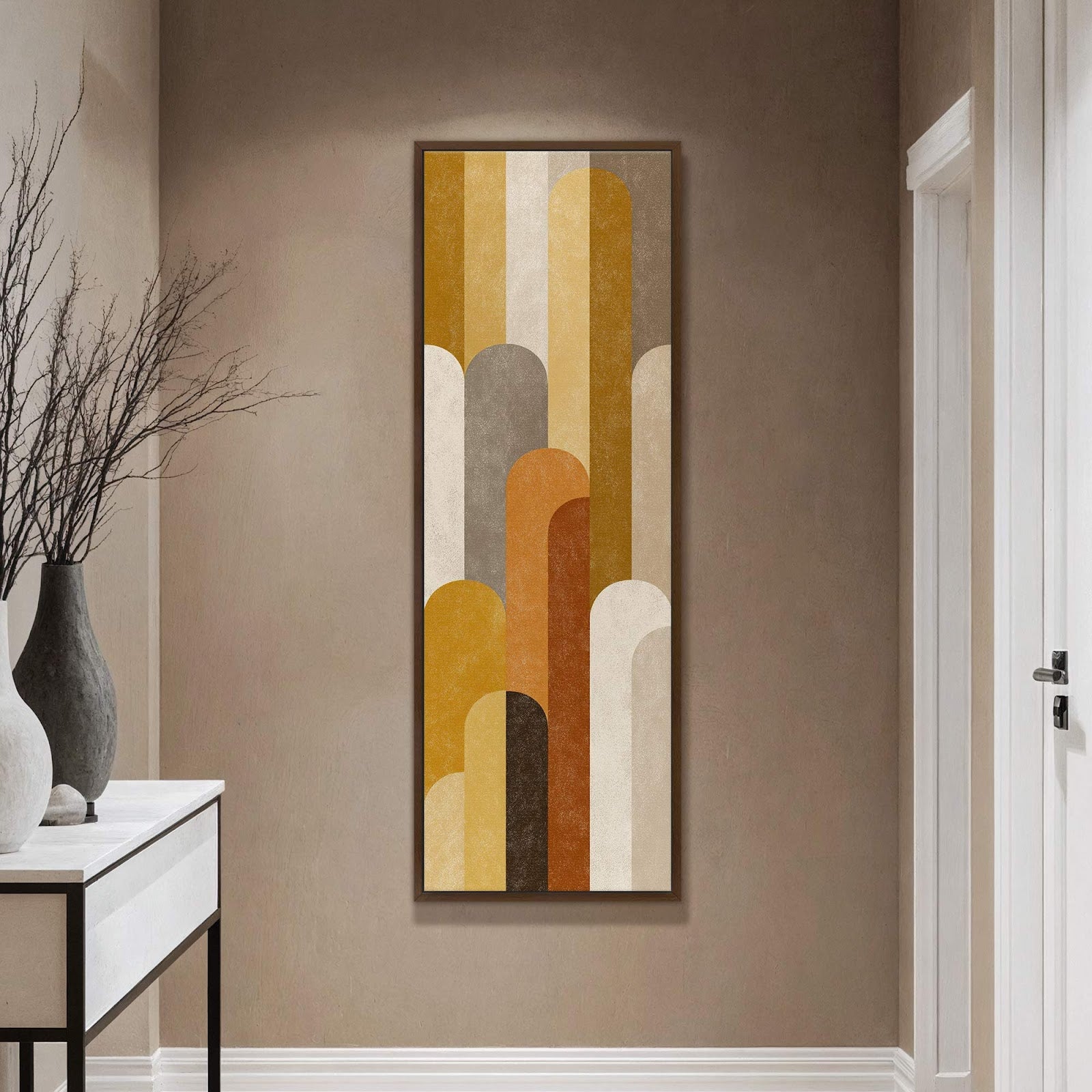 This vertical canvas wall art features a mid-century modern abstract design with rounded rectangular shapes in a warm palette of ochre, brown, and beige, displayed above a console table on.