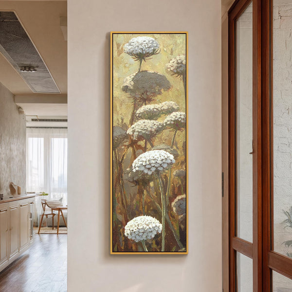 Vertical canvas wall art in interior setting.