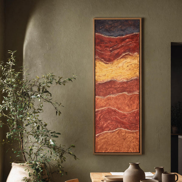 Vertical canvas wall art in interior setting.