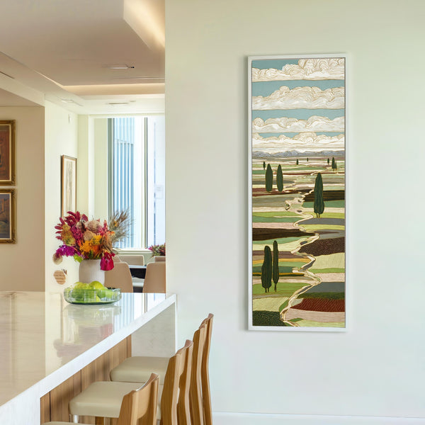 Vertical canvas wall art in interior setting.