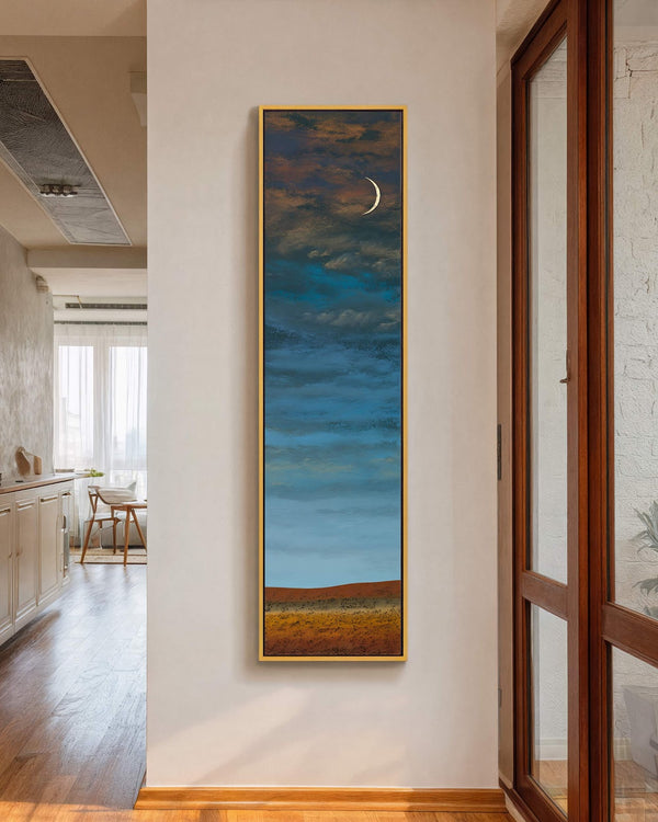 Vertical canvas wall art in interior setting.