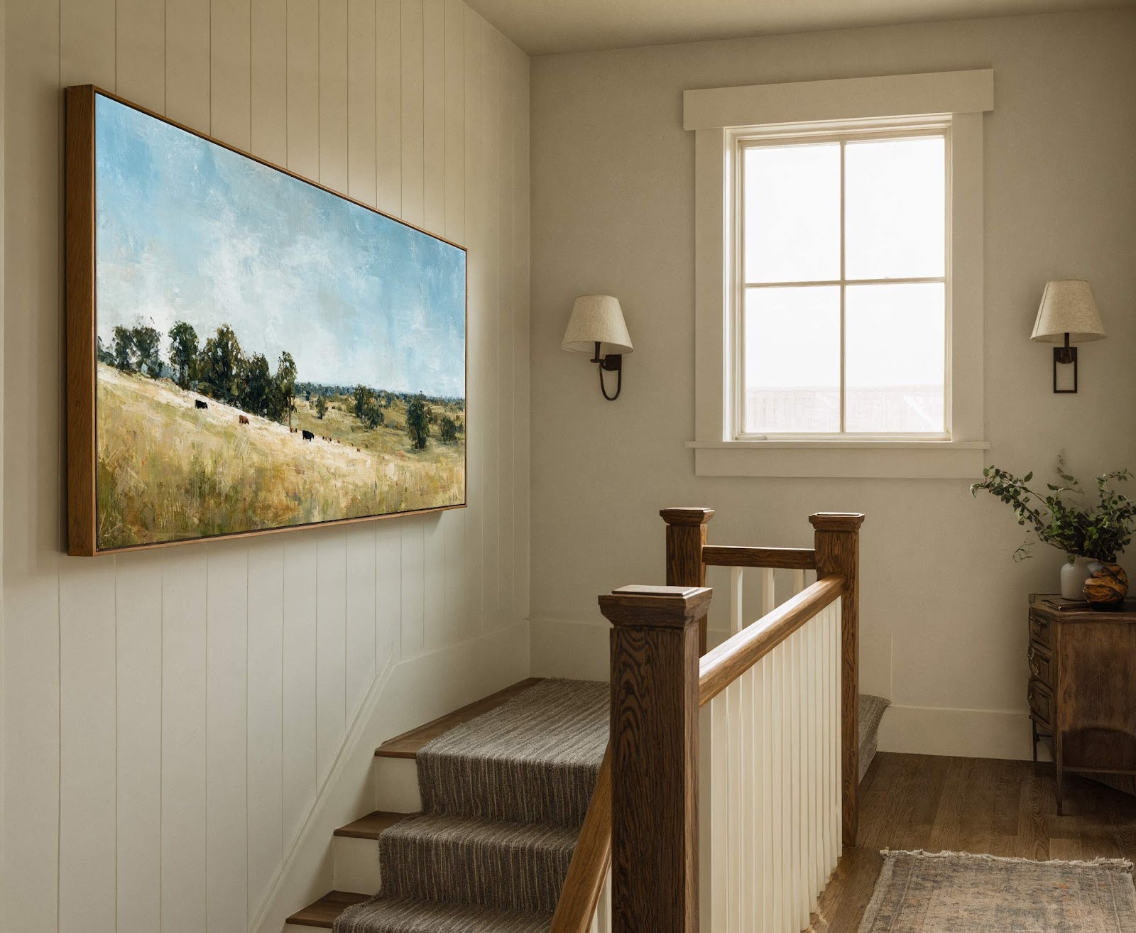 This horizontal canvas wall art displays a pastoral scene with cattle in a golden field under a blue sky, rendered in a loose, impressionistic style. It is framed in natural.