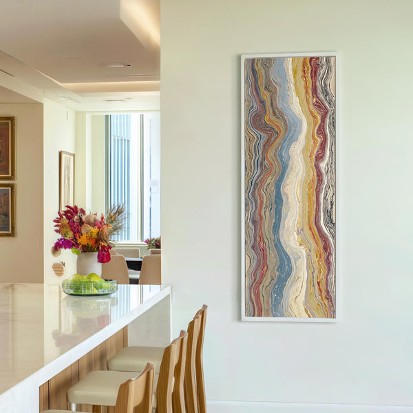 Vertical canvas wall art in interior setting.