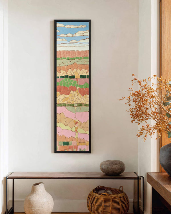 Vertical canvas wall art in interior setting.