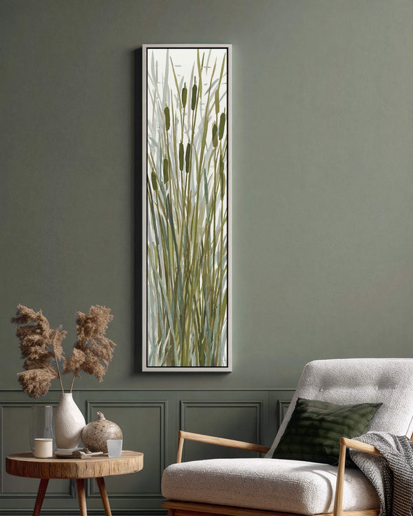 Vertical canvas wall art in interior setting.