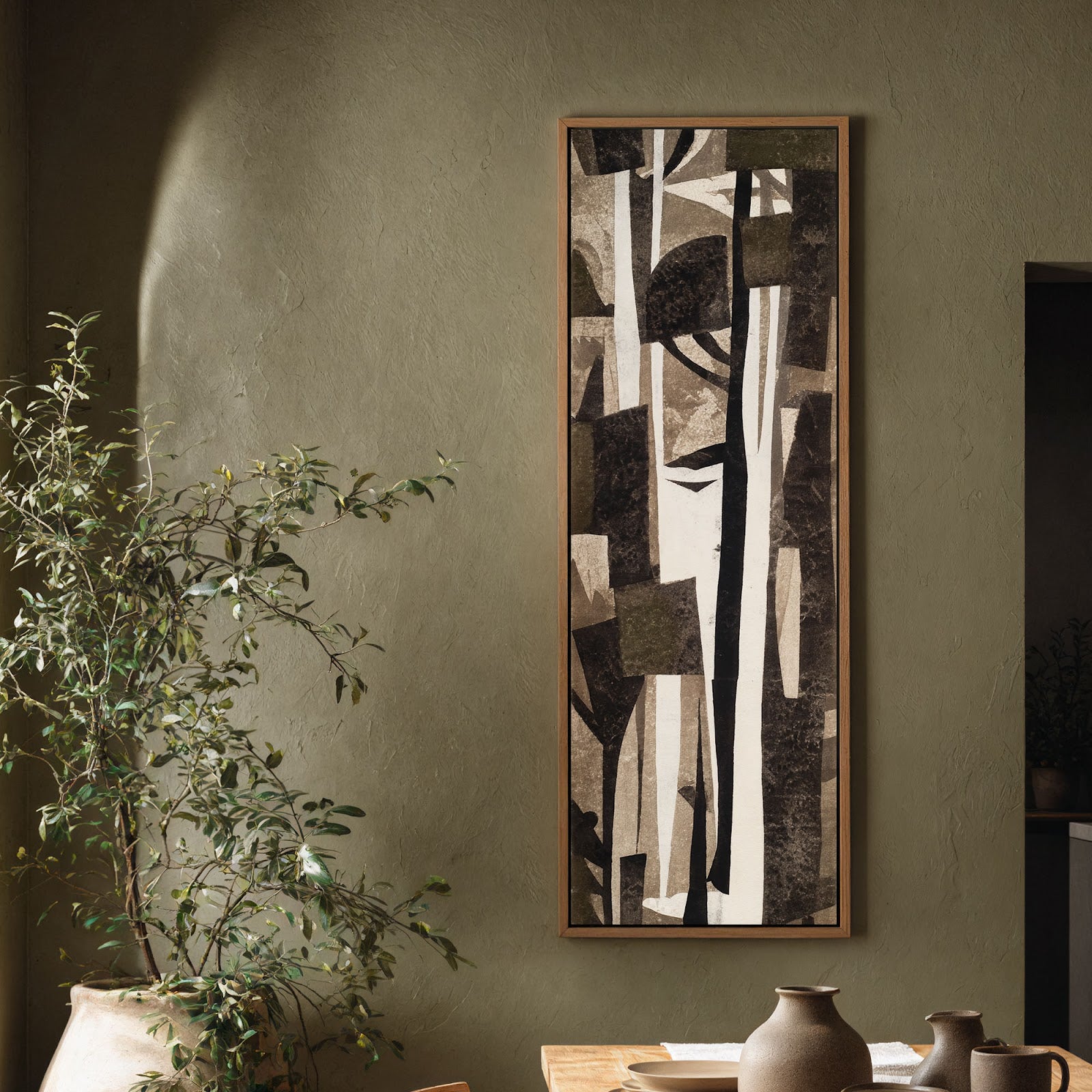 Vertical canvas wall art in interior setting.