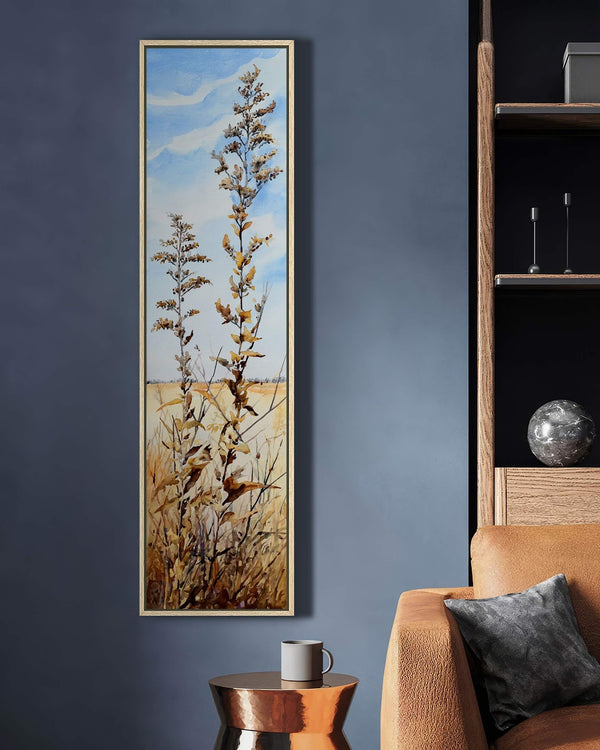 Vertical canvas wall art in interior setting.