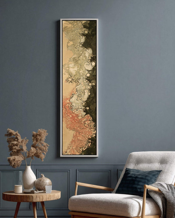 Vertical canvas wall art in interior setting.