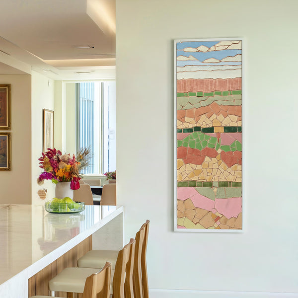 Vertical canvas wall art in interior setting.