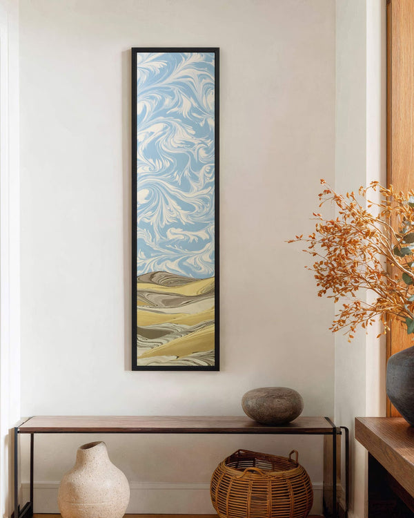 Vertical canvas wall art in interior setting.