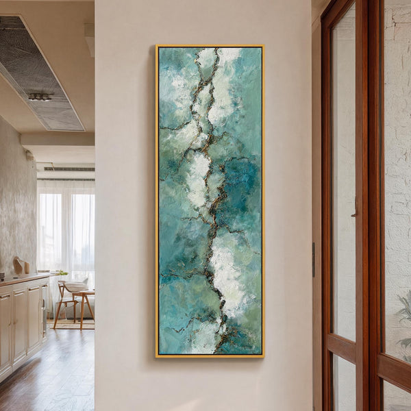 Vertical canvas wall art in interior setting.
