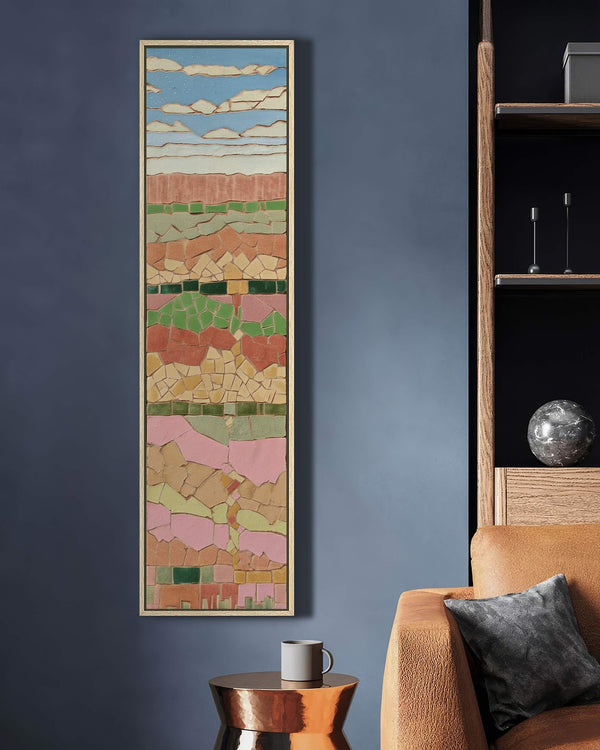 Vertical canvas wall art in interior setting.