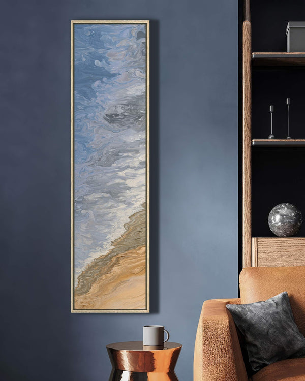Vertical canvas wall art in interior setting.