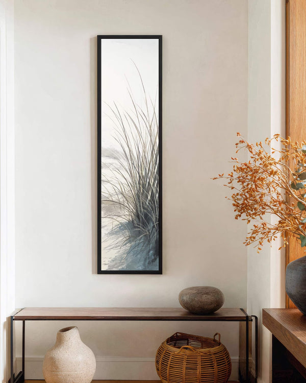 Vertical canvas wall art in interior setting.