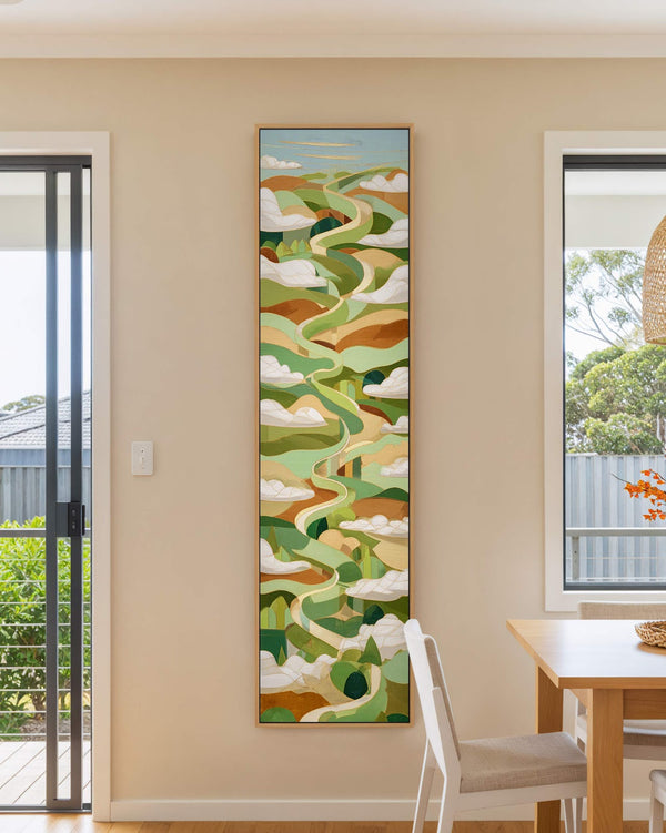 Vertical canvas wall art in interior setting.