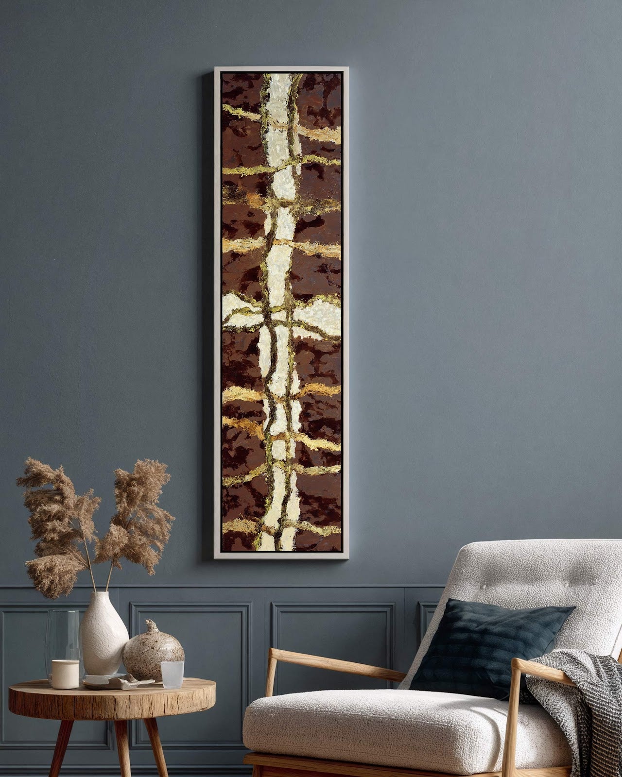 Vertical canvas wall art in interior setting.