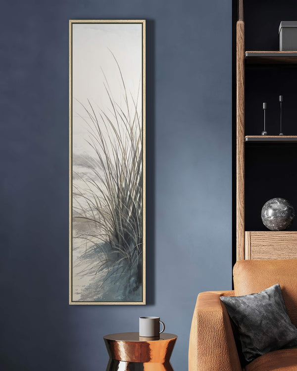 Vertical canvas wall art in interior setting.