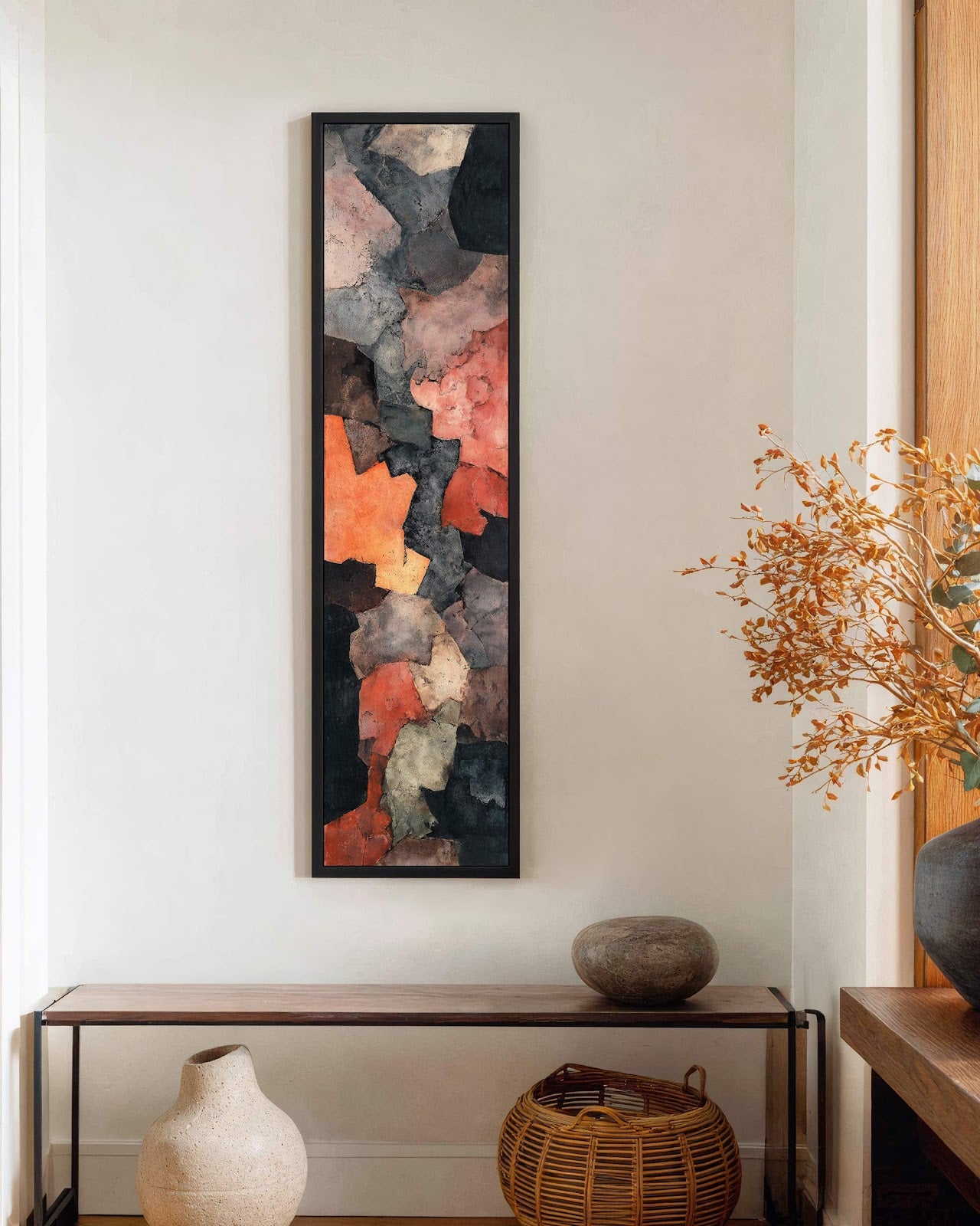 Vertical canvas wall art in interior setting.